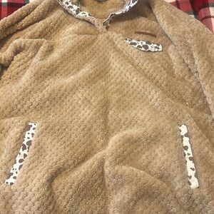 Cozy Tan Sherpa Pullover with Cow Print Accents